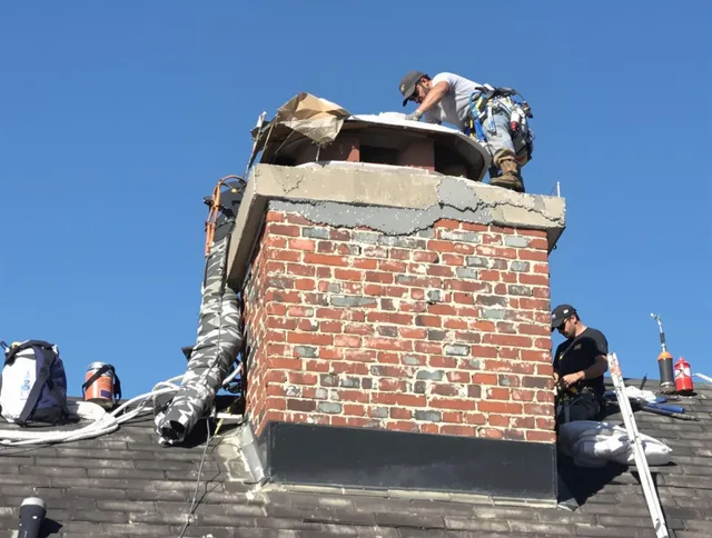 Culver City Chimney Sweep installing a custom chimney crown in Culver City, CA