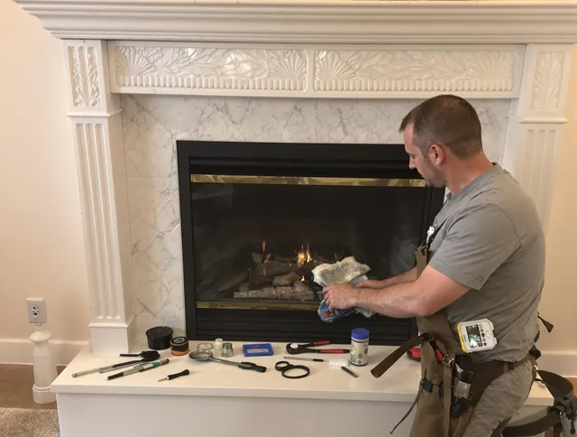 Culver City Chimney Sweep performing fireplace maintenance in Culver City, CA